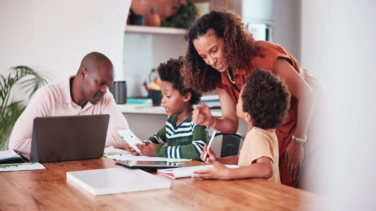 Happy black family writing