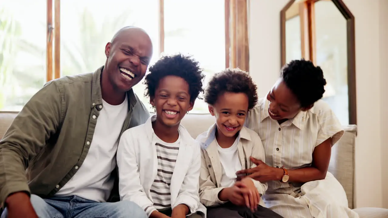 Happy black family face and relax on sofa