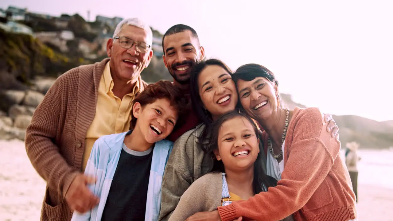 Beach smile and face of big family hugging