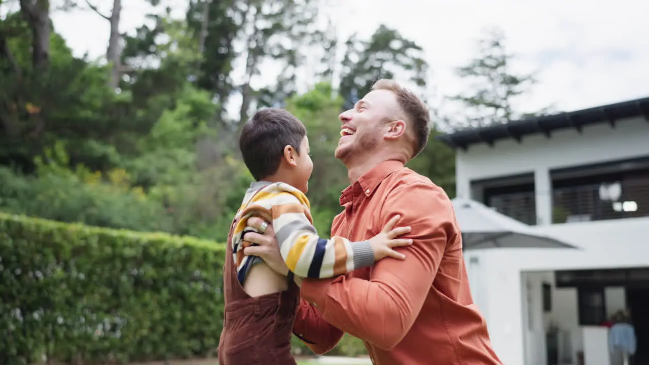 Dad garden and lift boy in air for game