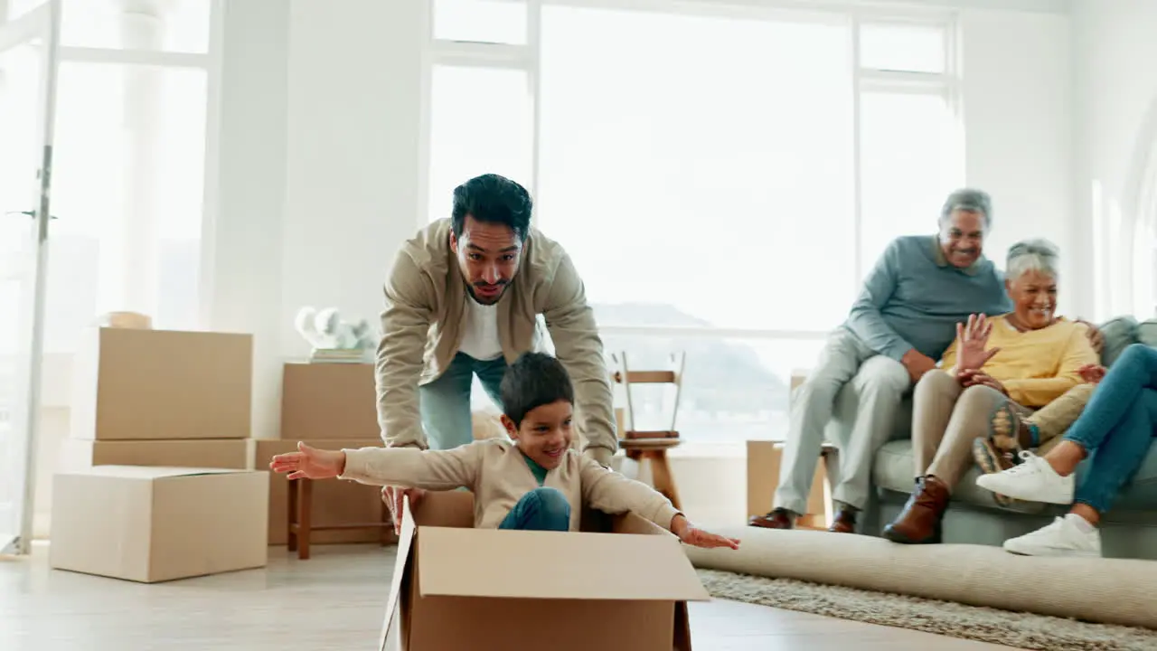 Father boy and push box in new home for airplane