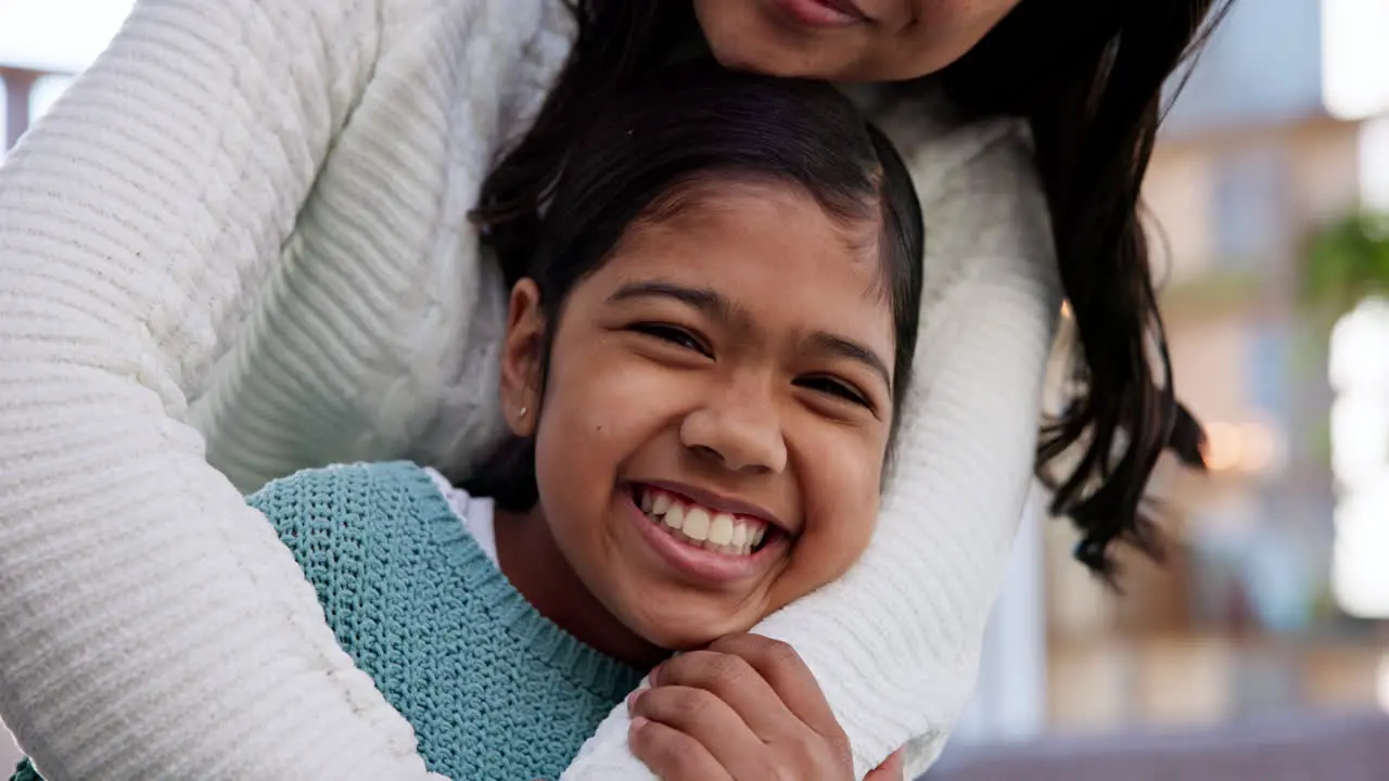 Love hug and face of girl with mother in home