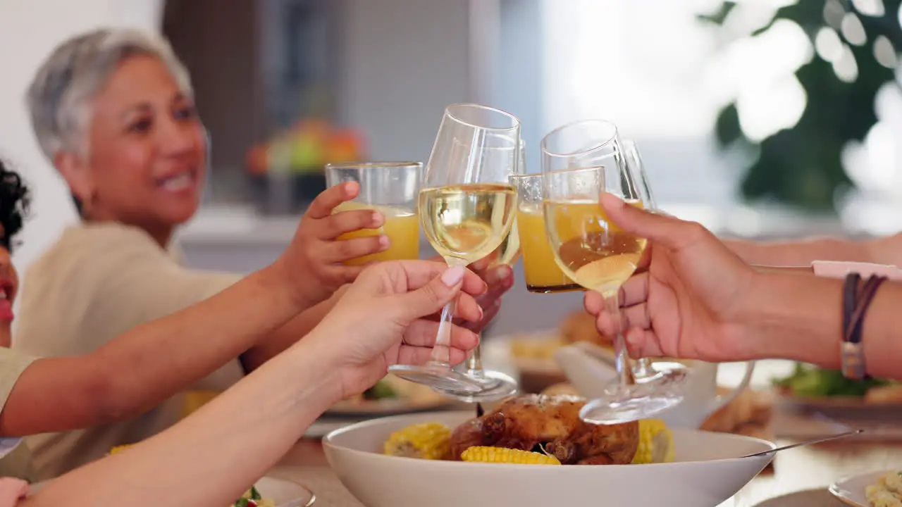 Happy family hands and cheers for dinner