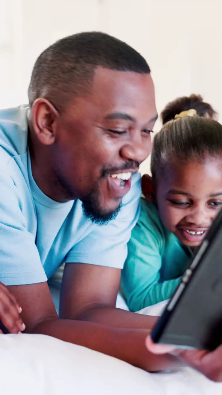 Black family relax and social media on tablet