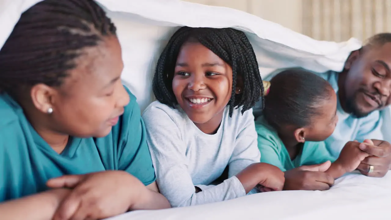 Parents talking or happy kids laughing in bedroom