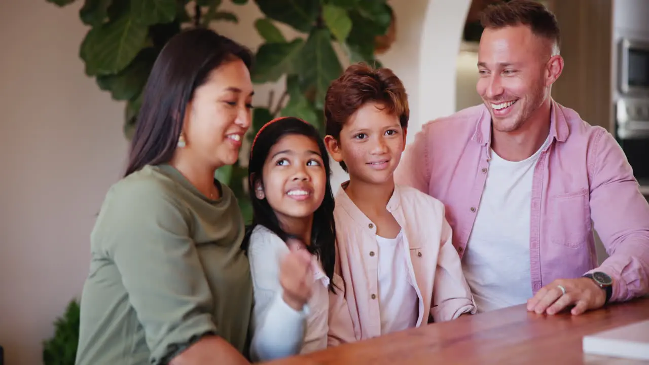 Happy family interracial and face in living room