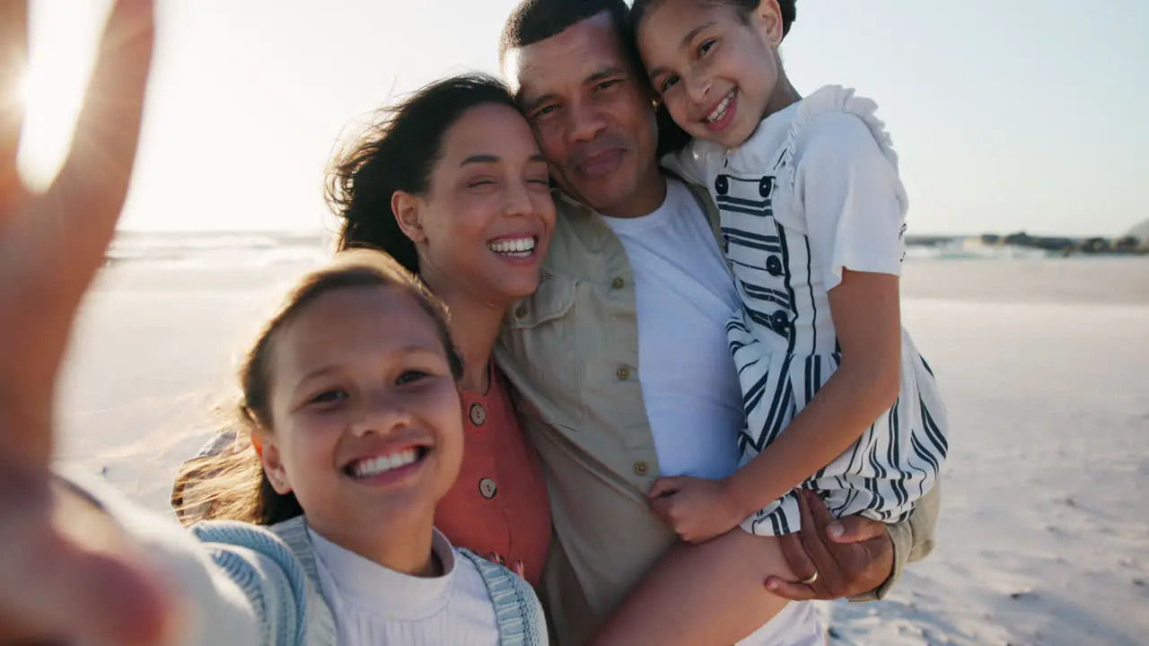 Girl kids parents and beach selfie with smile