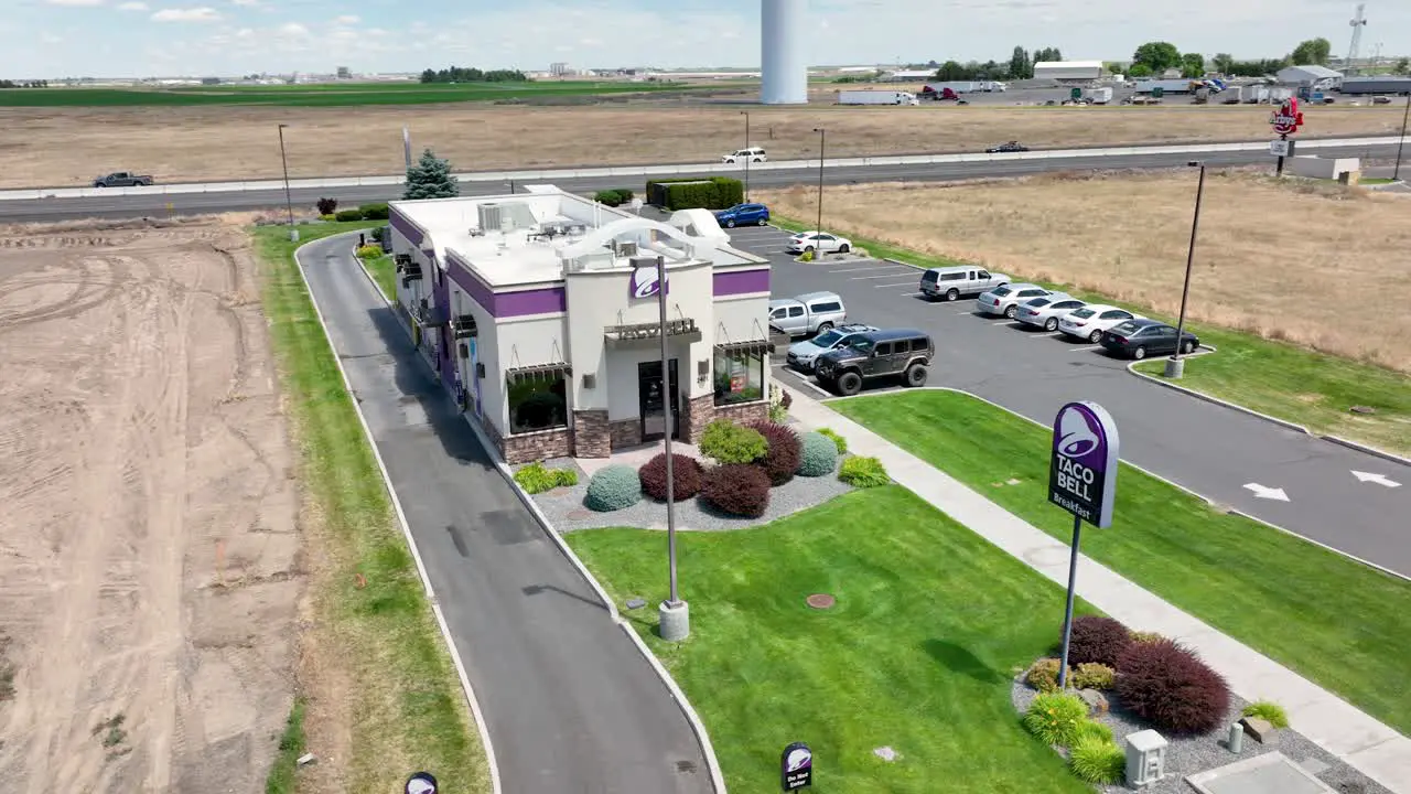 Wide establishing aerial shot of a Taco Bell restaurant