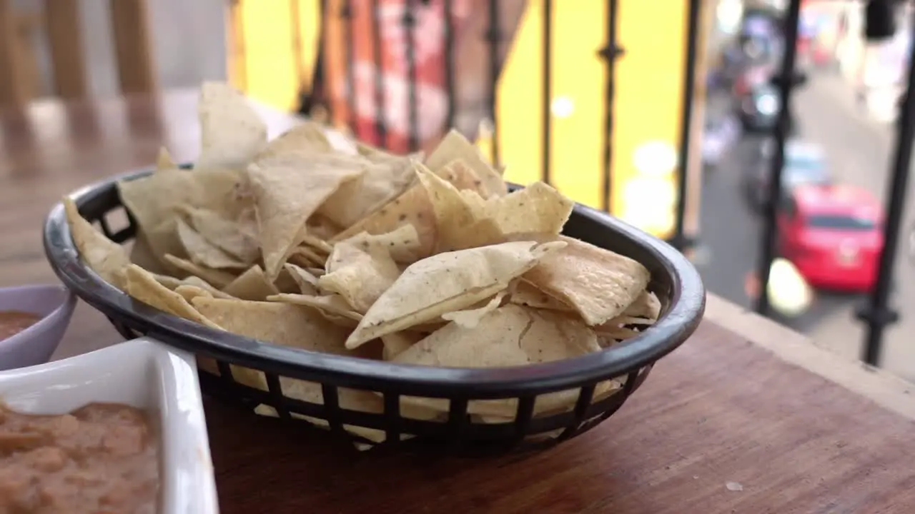 A view of tortilla chips served on the table of a house as an afternoon snacks