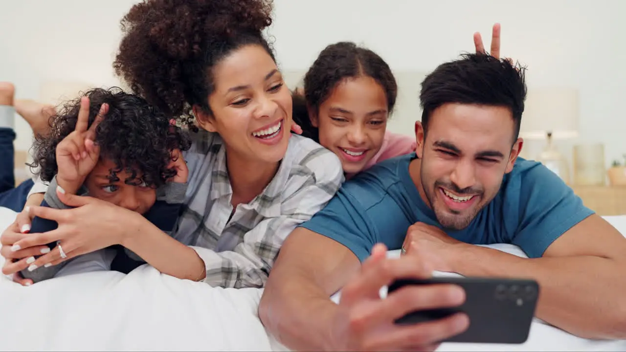 Happy family love and bed selfie in a house