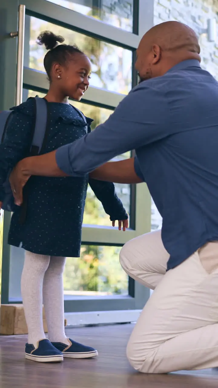 Father daughter and hug for school