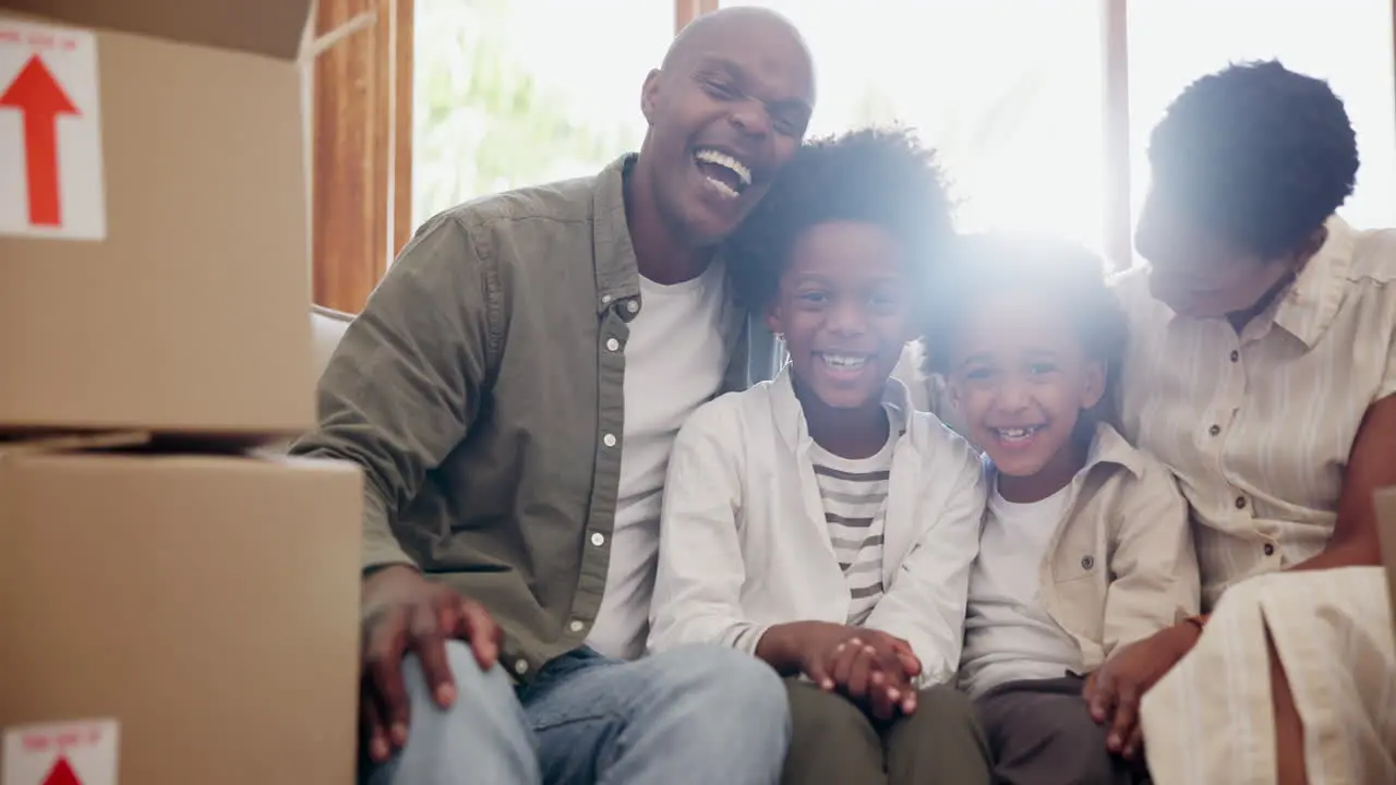 Happy black family box and relax in new home