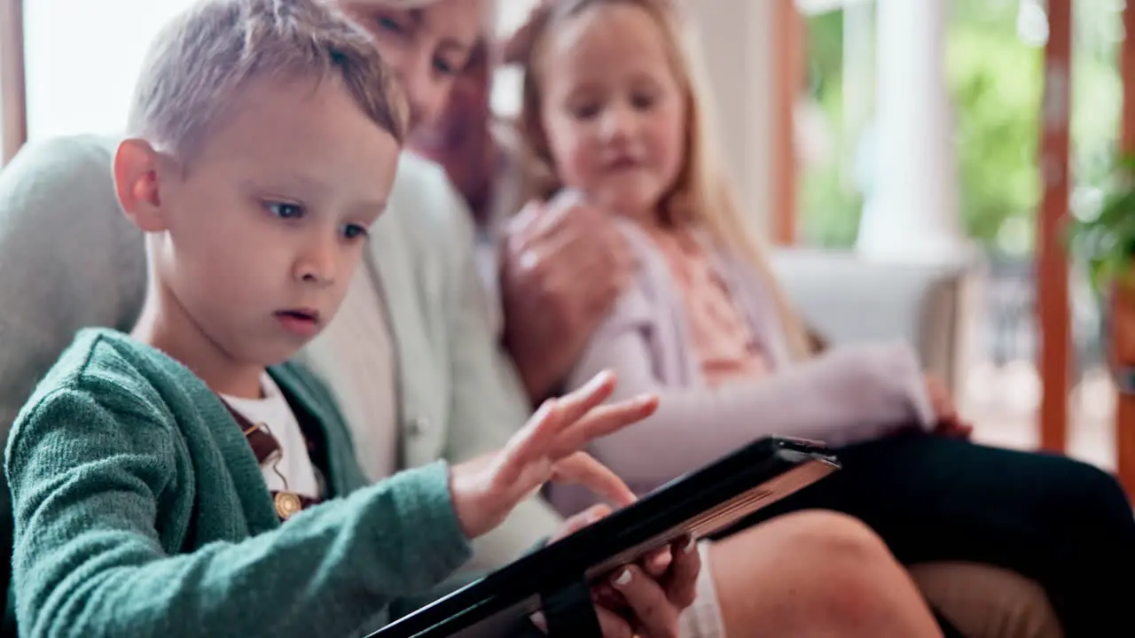 Happy tablet and children with grandparents