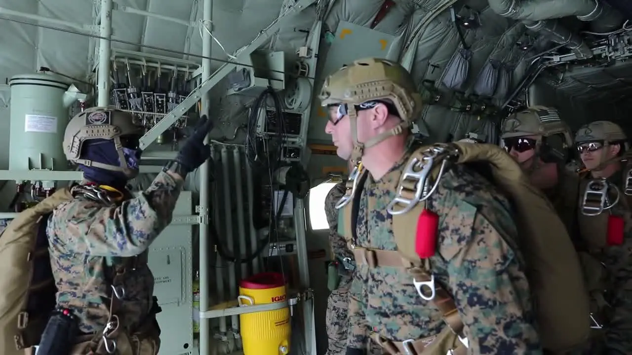 Us Military High Altitude Low Opening Sky Diving Training Exercise Over The Blue Waters Of The Pacific Ocean