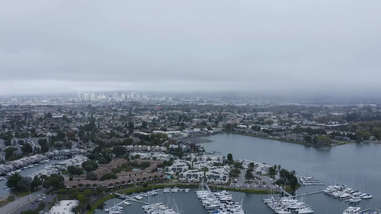 Urban landscape on an overcast day with the city and mountains