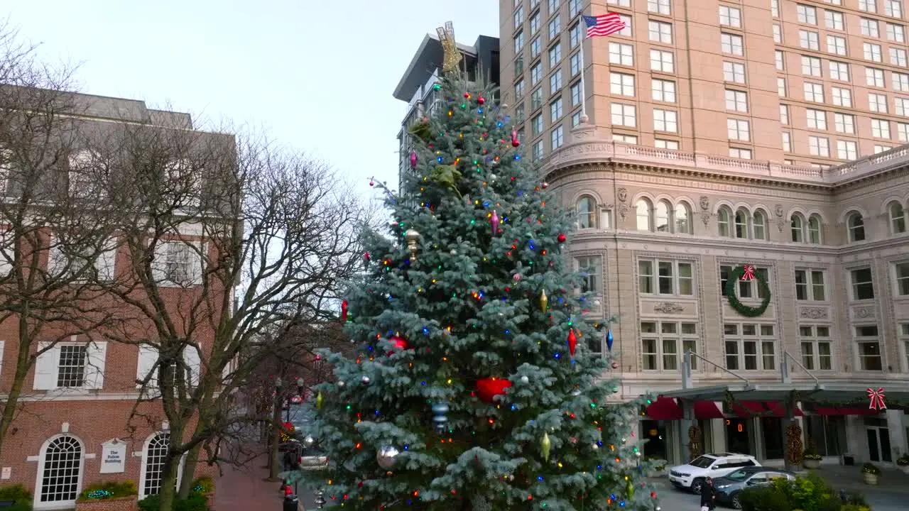 Close up aerial rising shot of Lancaster PA clock in downtown square