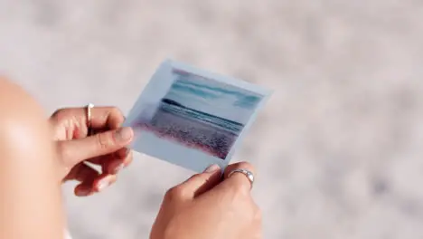 Hands photo and woman with polaroid of beach