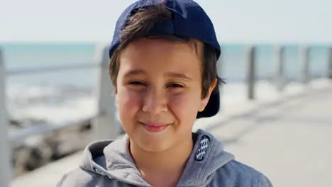 Smile beach and face of child at ocean