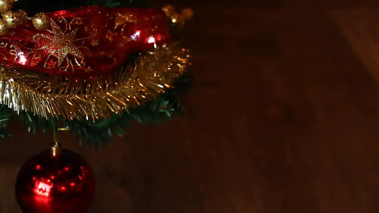 Cinematic Holiday Season b roll footage background of red and golden ornaments and baubles