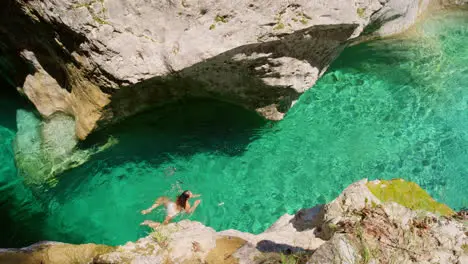 Island woman swimming and tropical view