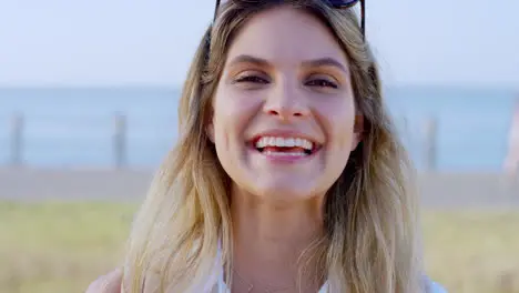 Woman face or laughing by beach