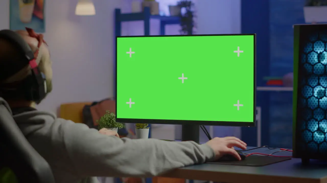 Pro gamer streaming video games with mock-up display