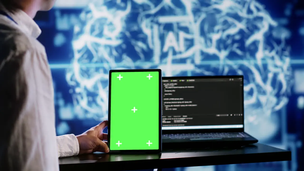 AI script coding on green screen tablet