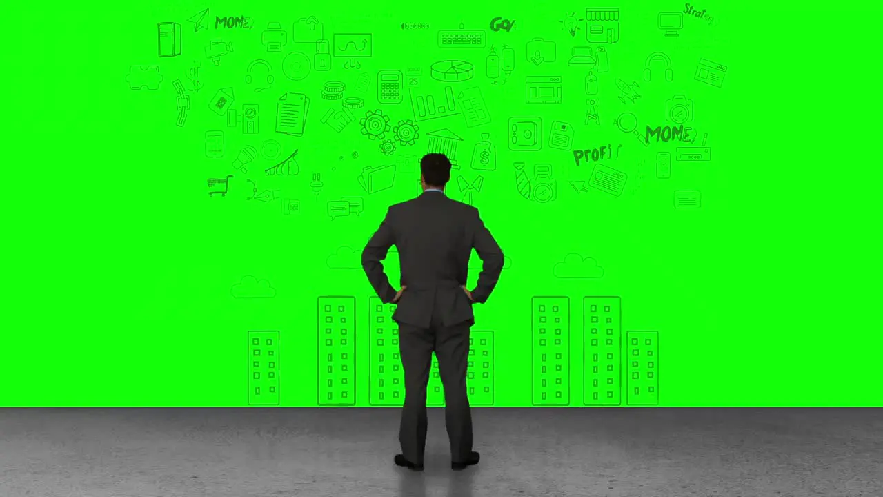 Businessman looking at green interface