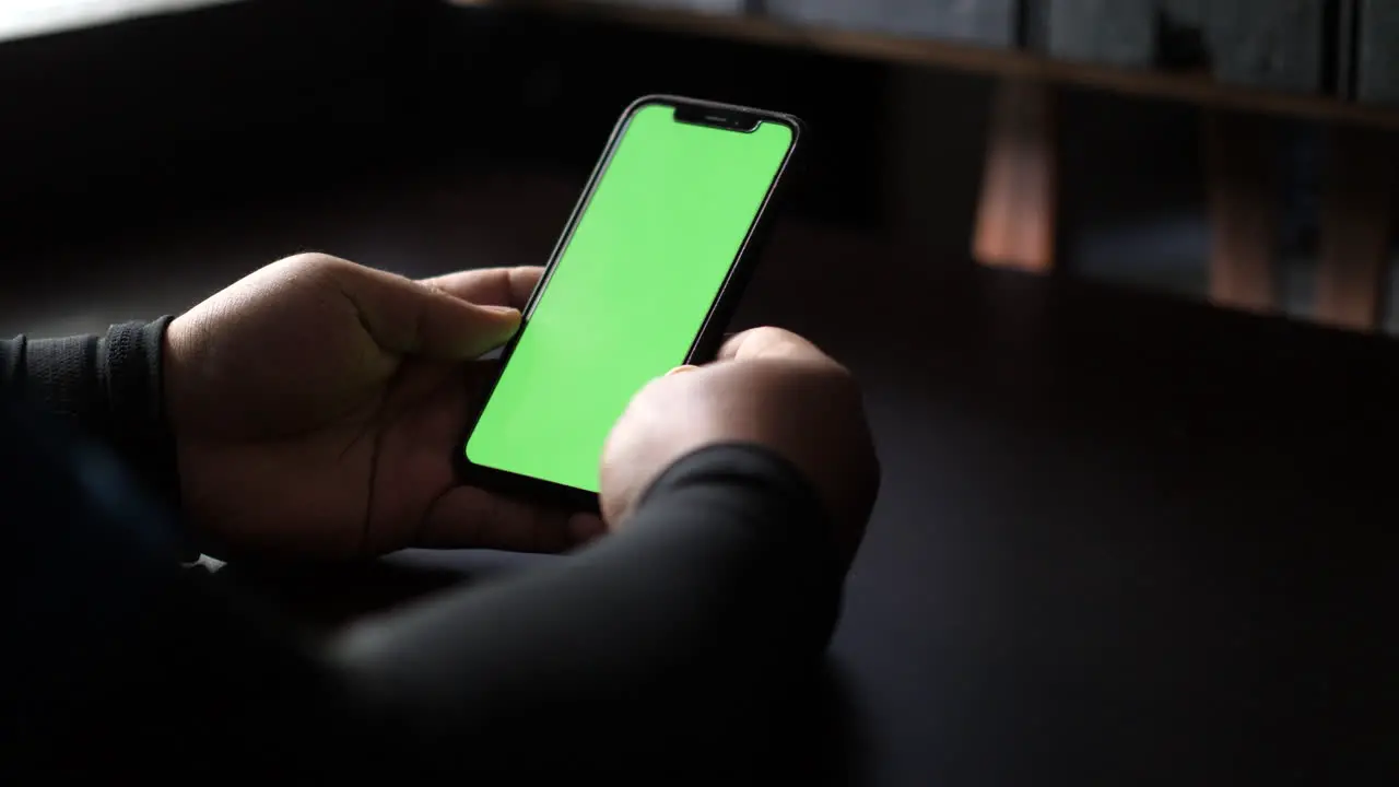 Close up and slide movement of a man facetime with a smartphone