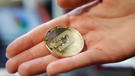 Woman hand holding gold dash coin Cryptocurrency exchange business