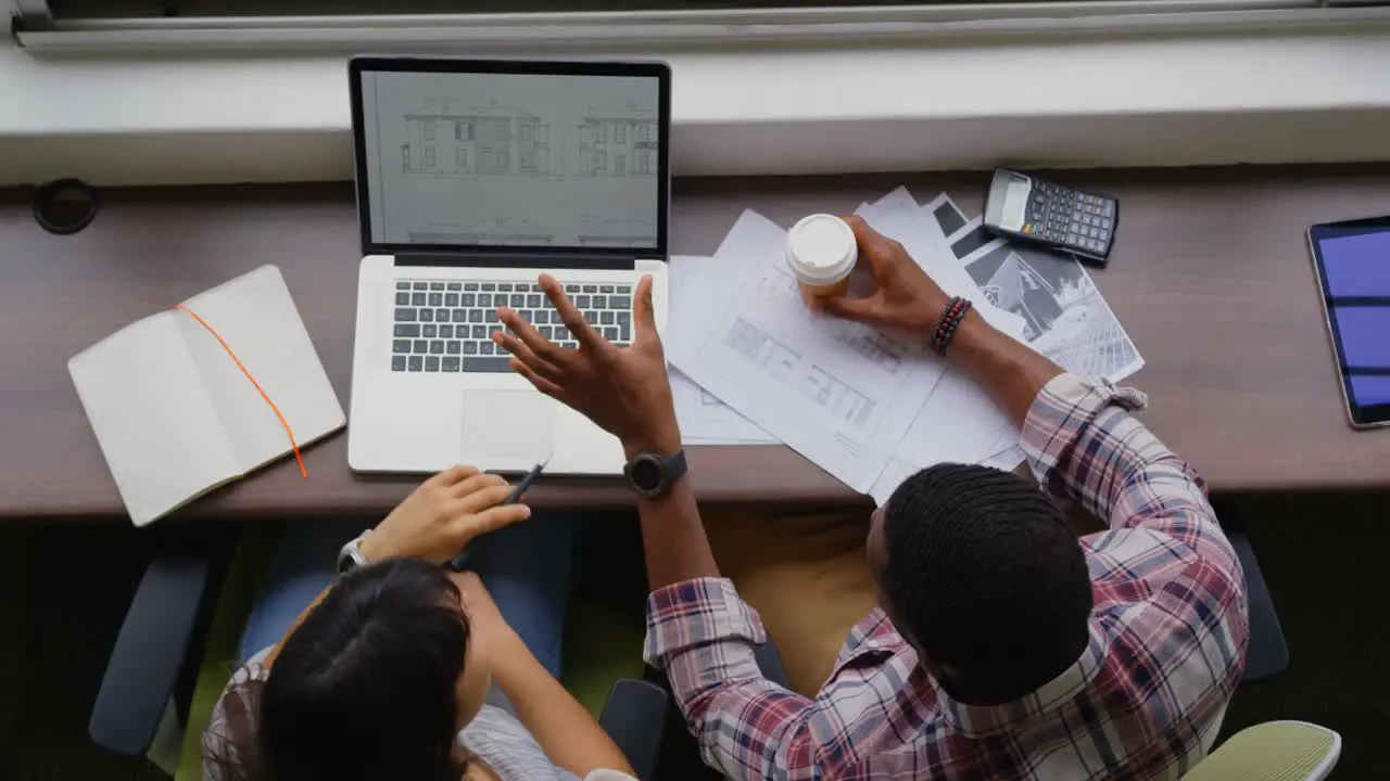 Business people working on laptop in a modern office 4k