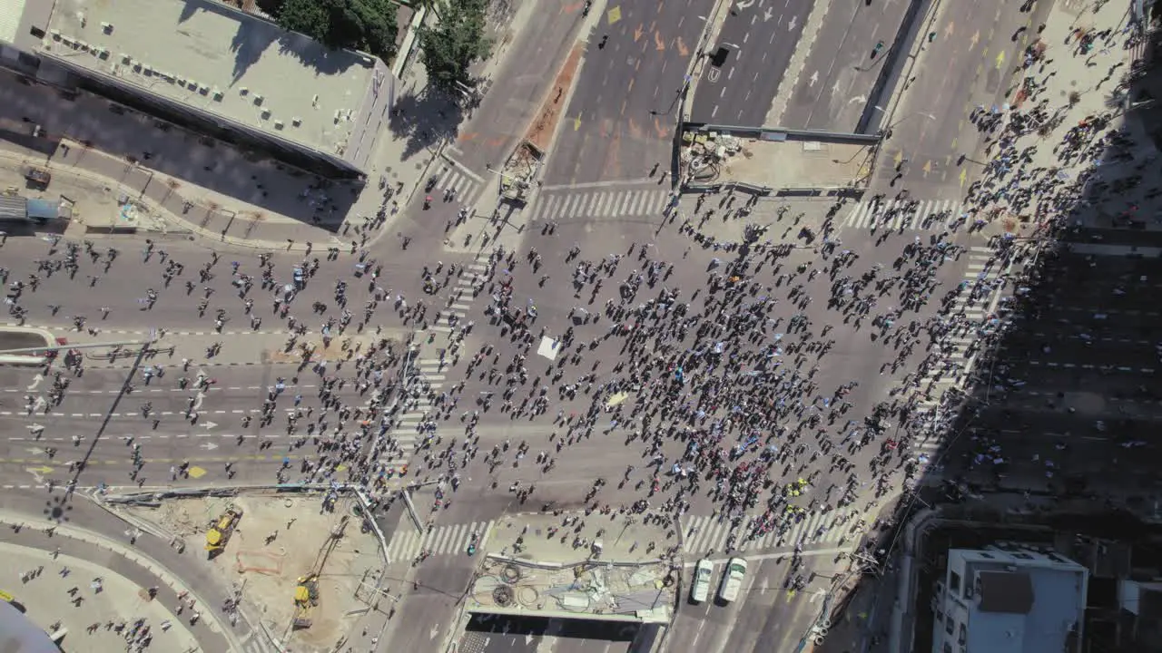 drone shot top down over the center of the protests in Tel Aviv against the Supreme court trample