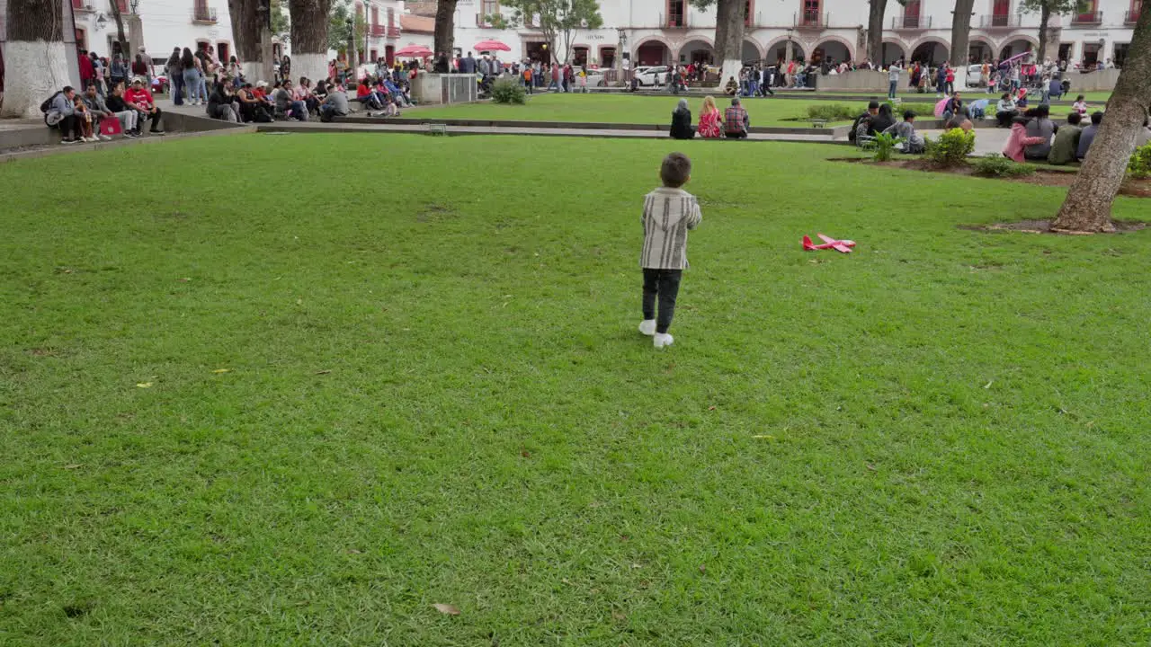 A kid in the main square of Patzcuaro at the balloon festival