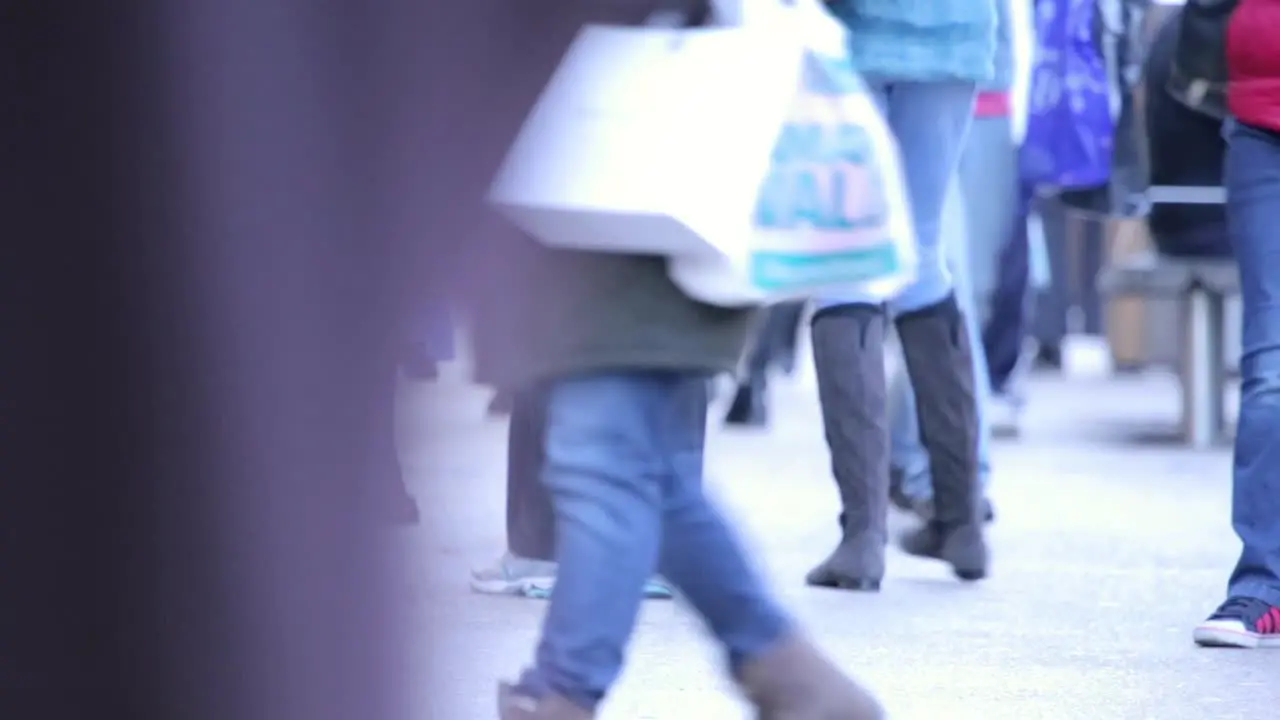 Pedestrians Legs Pull Focus in Town