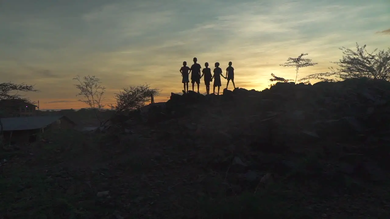 Children standing on hill in Kenya Africa