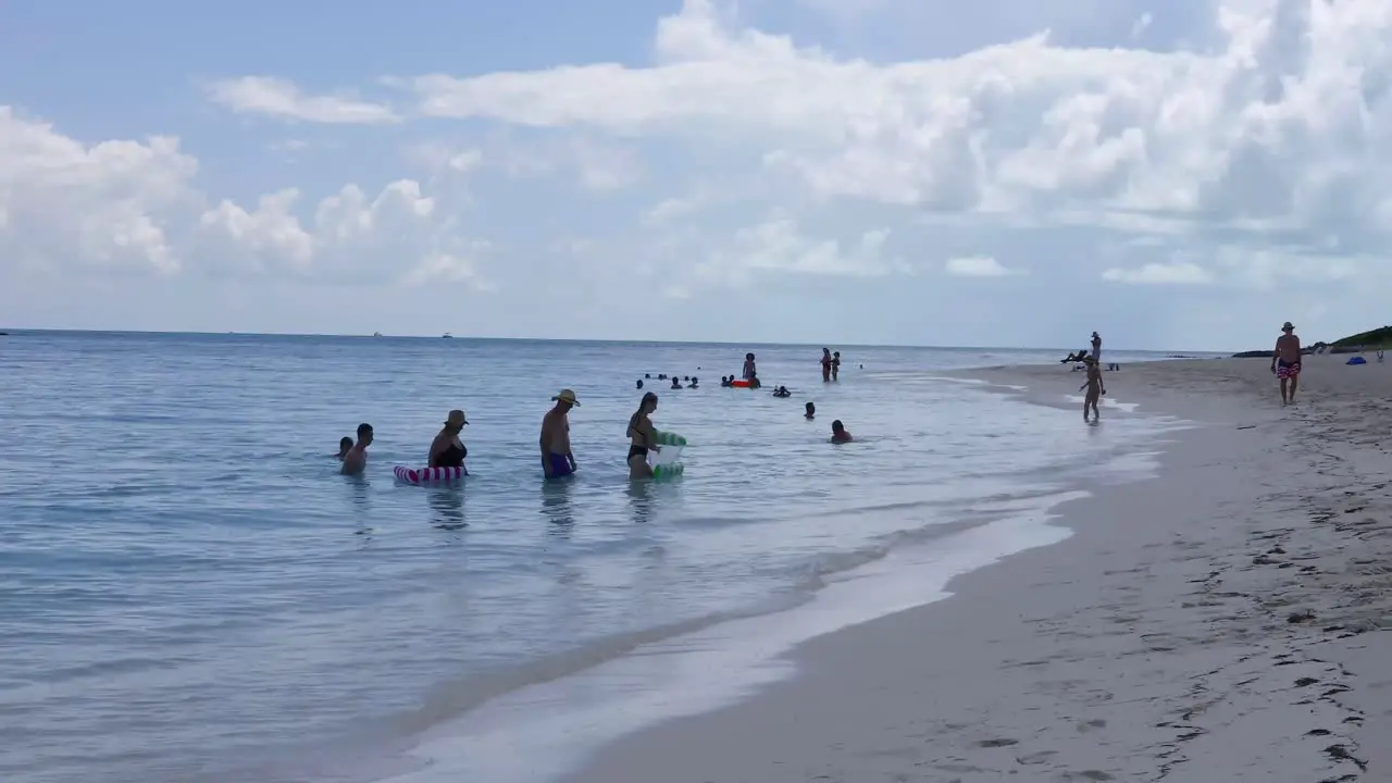 This is a video of people on the Tropic of Cancer beach on Exuma in the Bahamas