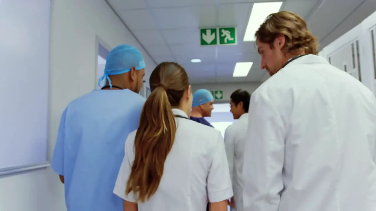 Medical teams walking in the corridor at hospital 4k