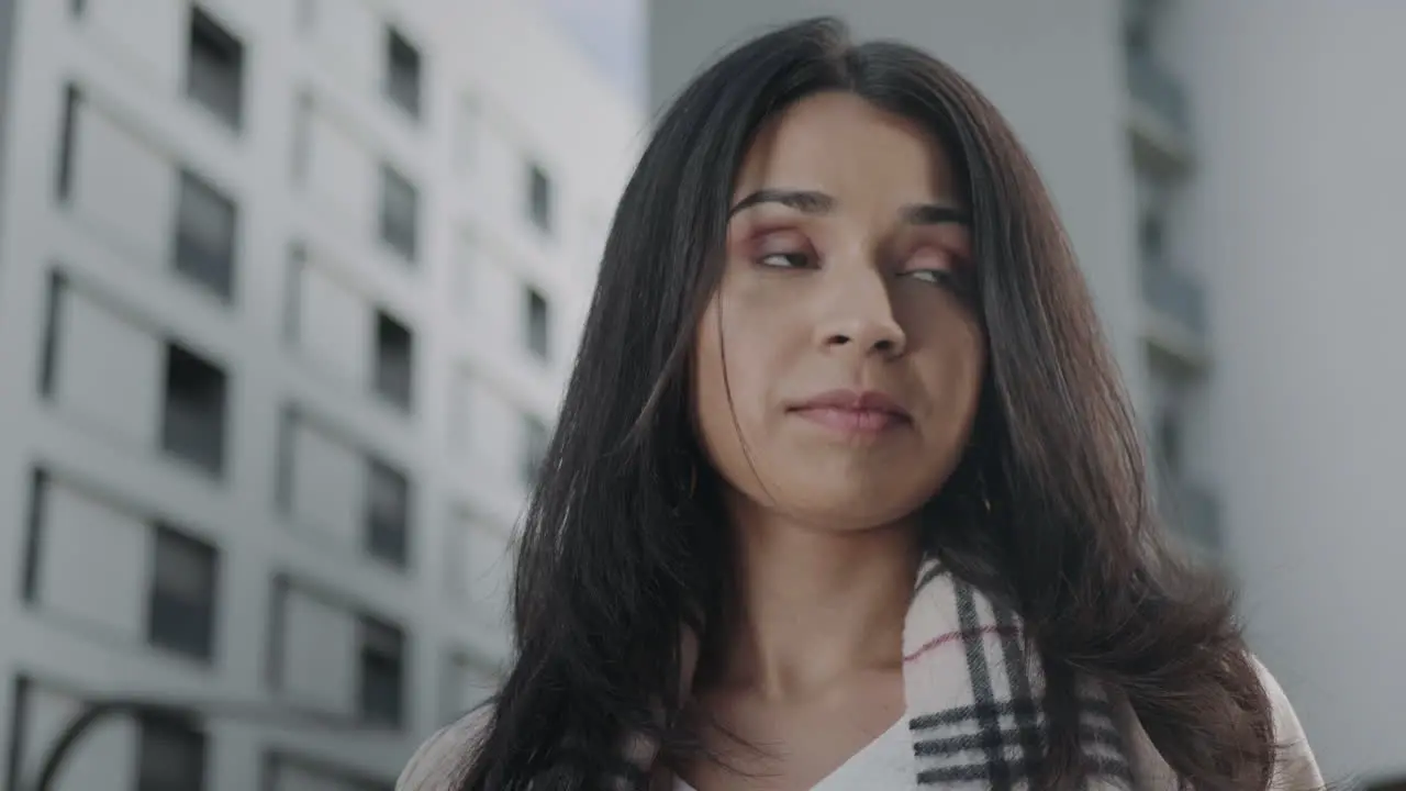 Businesswoman using smartphone on street Closeup worried girl waiting outdoors