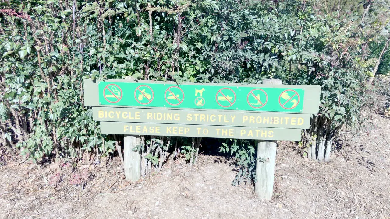 Caution sign on entry to Ju Raku En Japanese Garden Toowoomba Australia