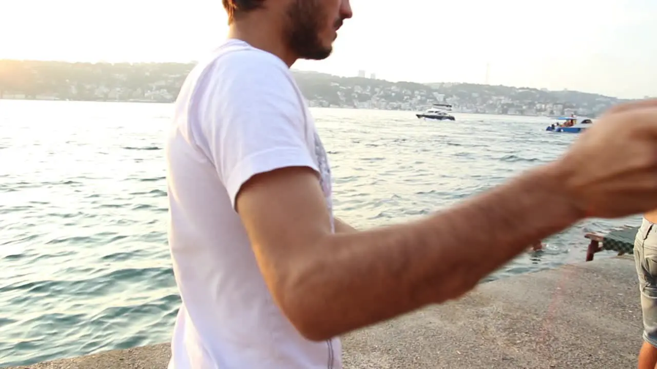 The Fisherman Preparing The Fishing Rod 1