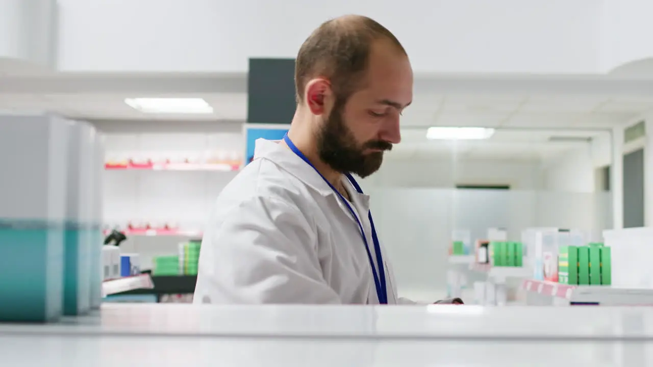 POV of retail clerk taking medical products off of shelves