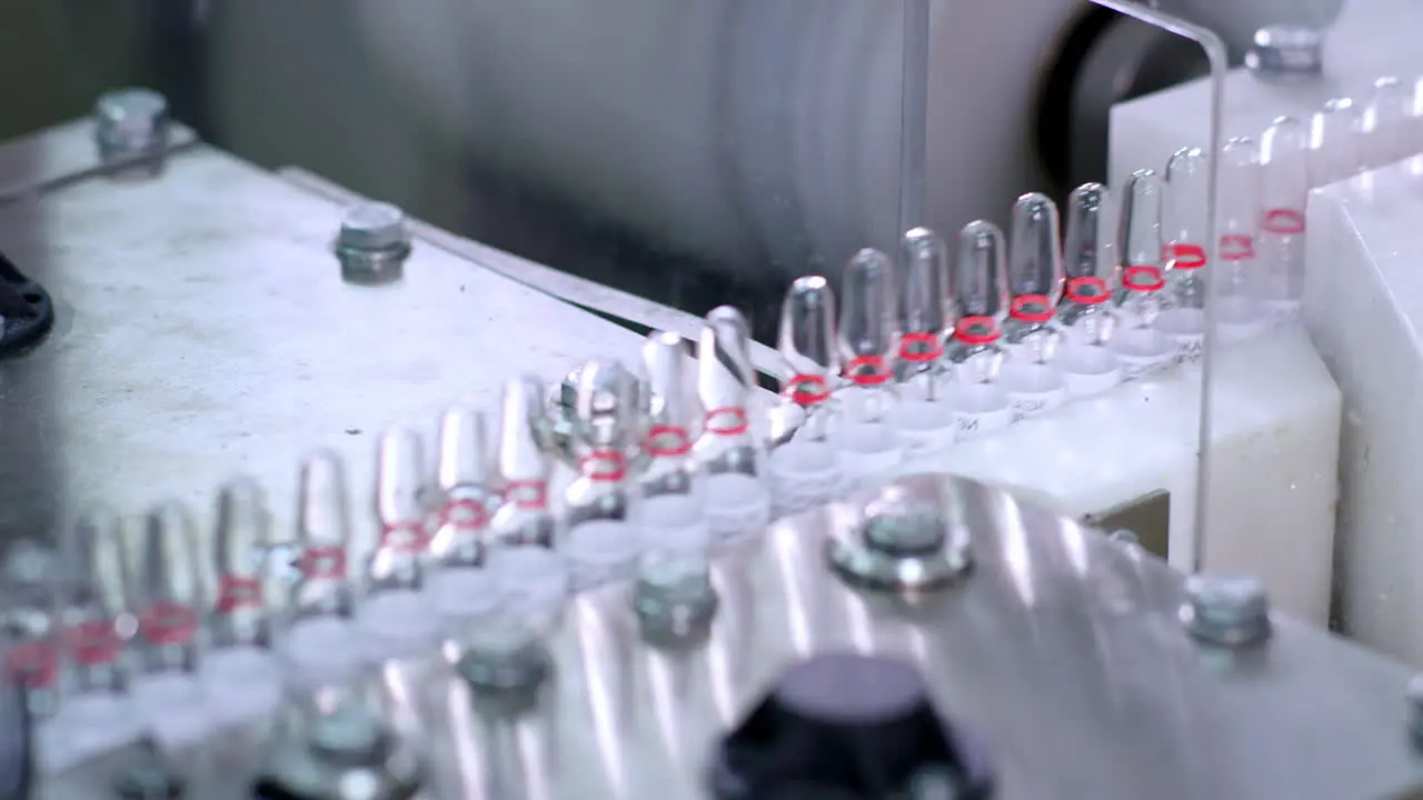 Medical vials on production line at pharmaceutical plant Medical ampoules