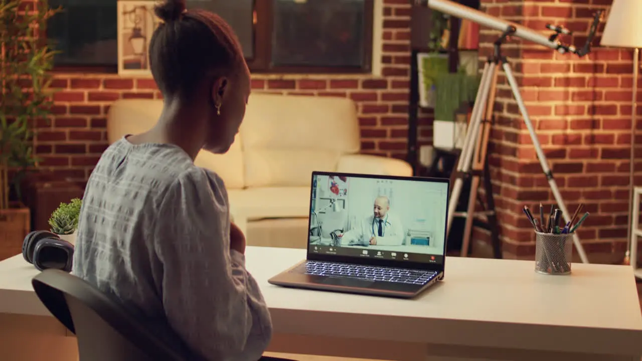 Woman using telehealth videocall