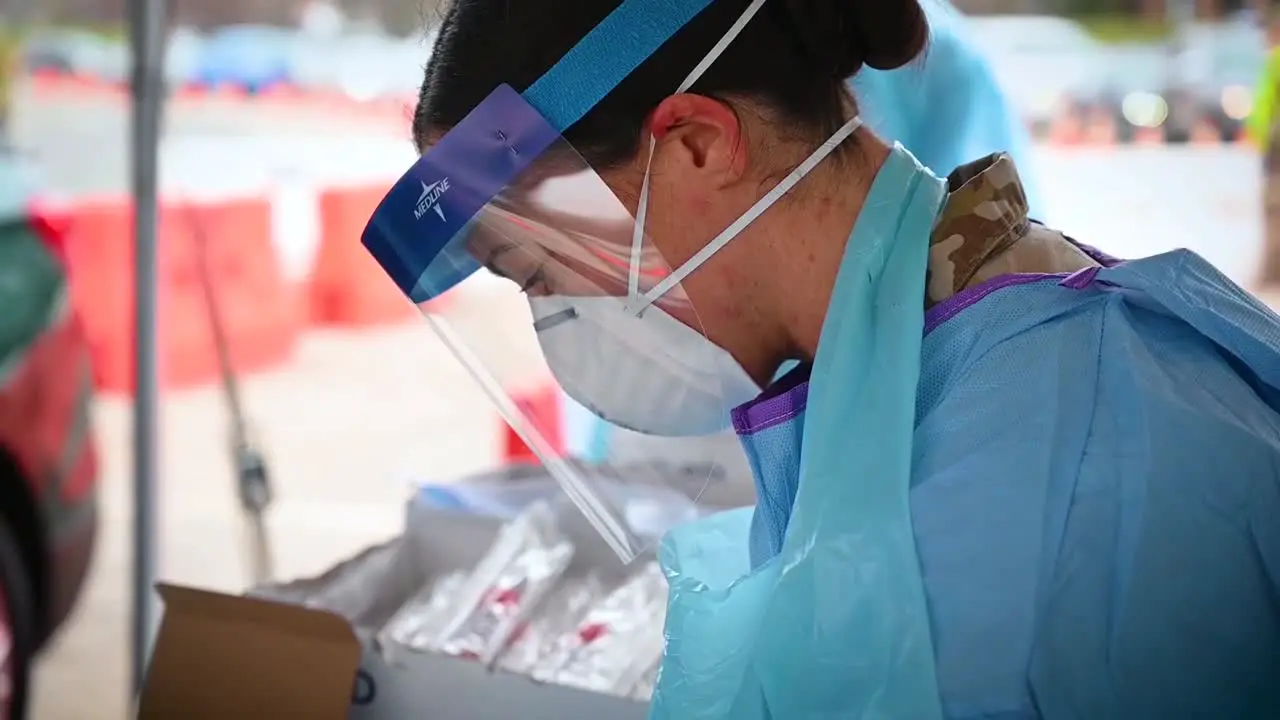 Covid19 Coronavirus Patients Are Tested At A Drive Thru Clinic Gowns Masks And Hand Sanitizer Shown 1