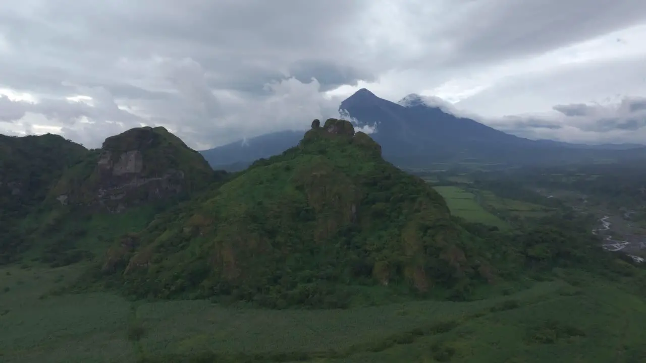 Wide shot countryside of Guatemala with fuego and Acatenango in background aerial