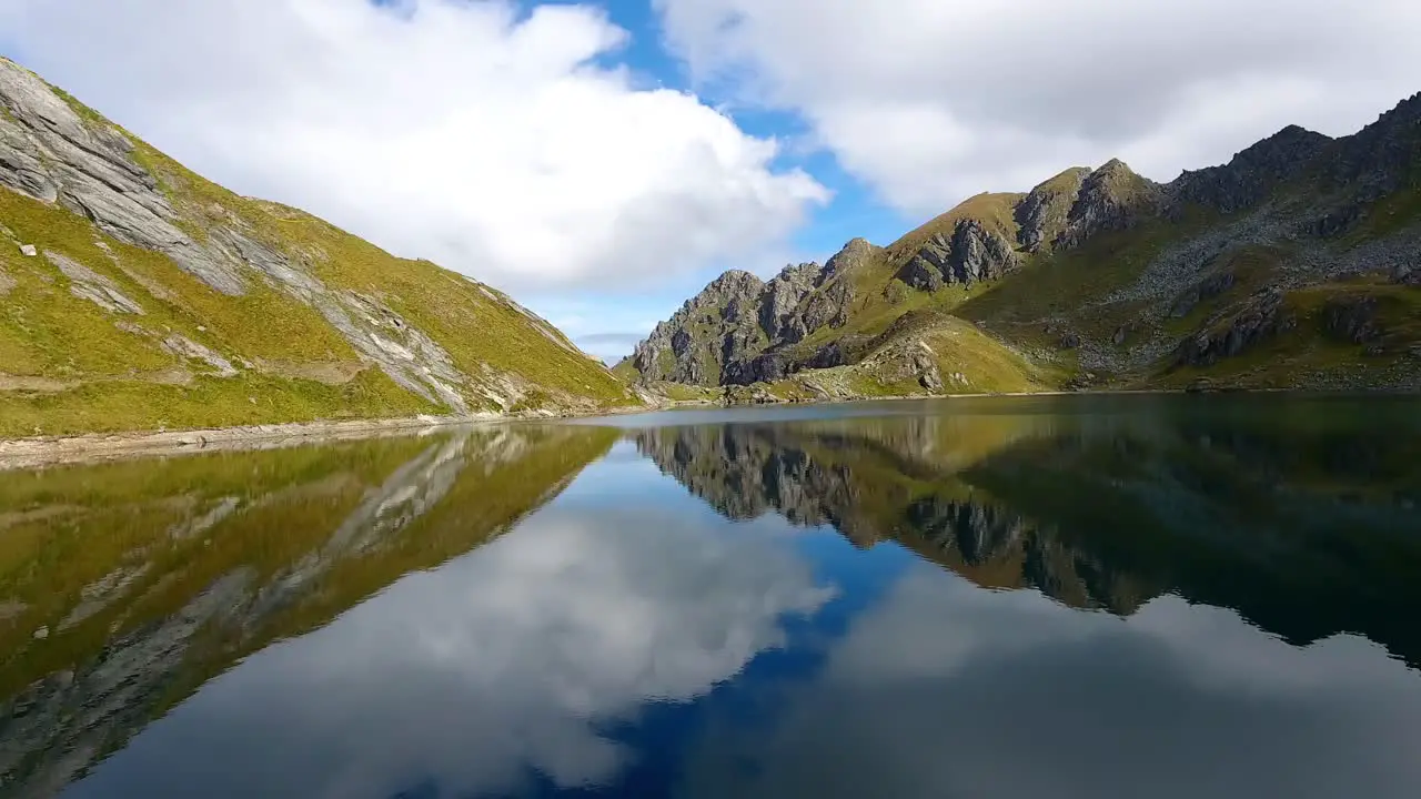 Perfect reflection flying over mountain lake