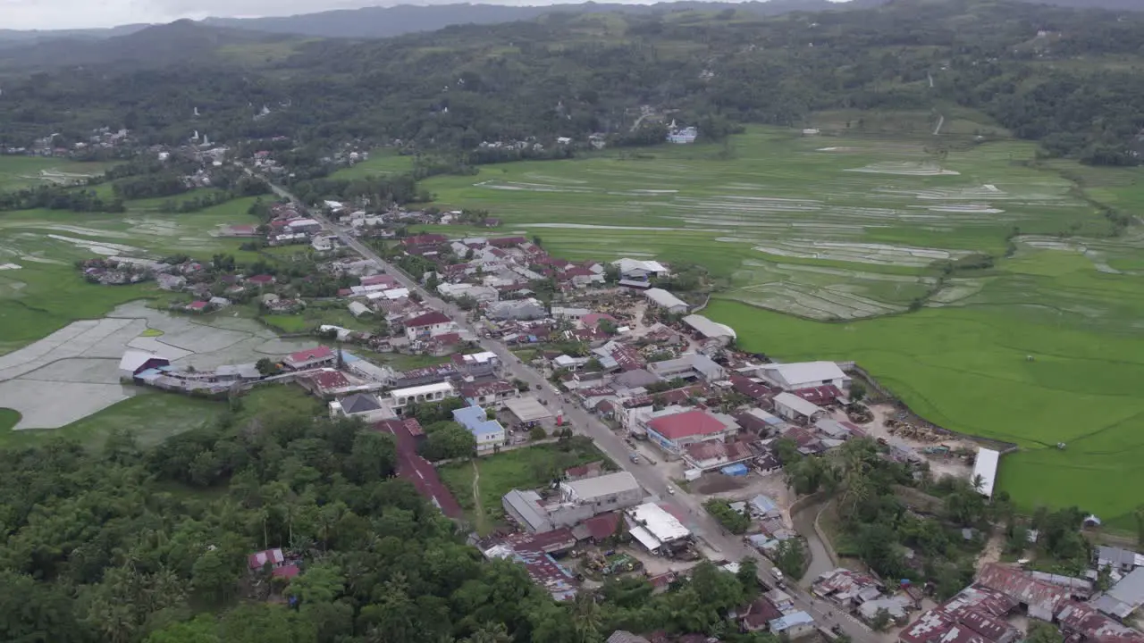 panorama shot of Waikaboebak city during a cloudy day at Sumba island aerial