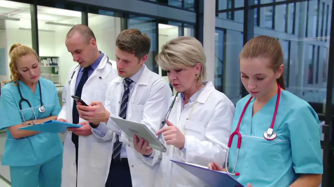 Doctors working in corridor