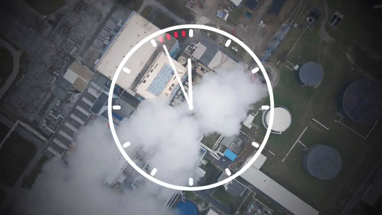 Time to reduce CO2 emissions clock overlay with a smoking chimney background