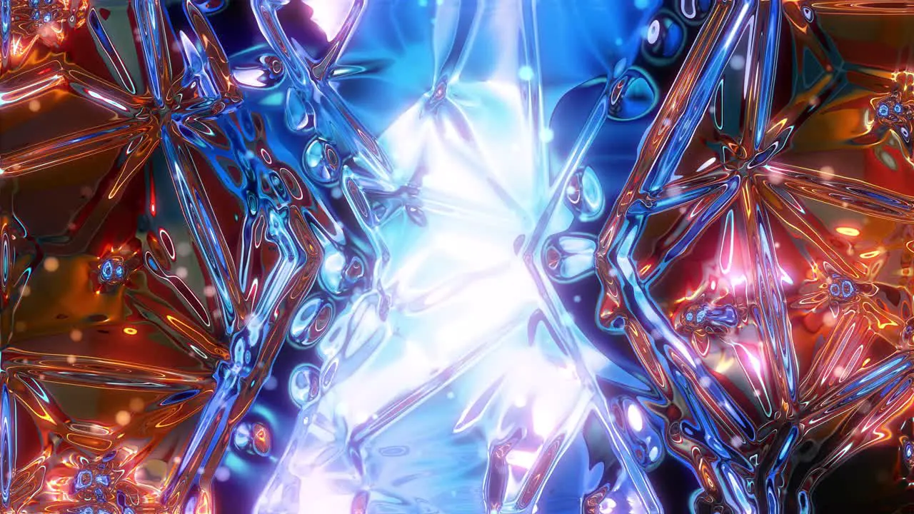 Animation of computer generated blue and orange glassy psychedelic kaleidoscope with mesmerizing liquid shapes and pattern